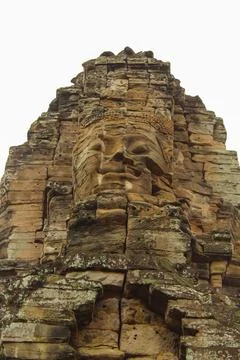 Close up on one of the Bayon stone faces, Siem reap, Cambodia Stock Photos