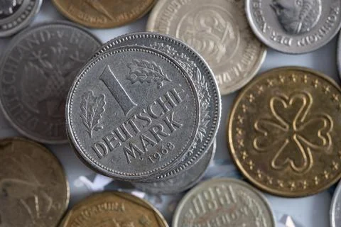 Close up of one deutsche mark on top of stack Stock Photos