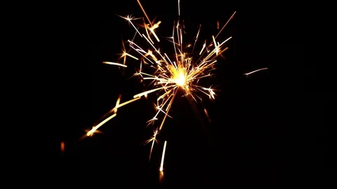 Close up one firework sparkler over black Video stock 86240719