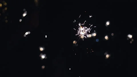 Close up one firework sparkler over black background Stock Footage 116895053
