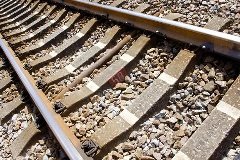Close-up of one section of the railway track Stock Photos