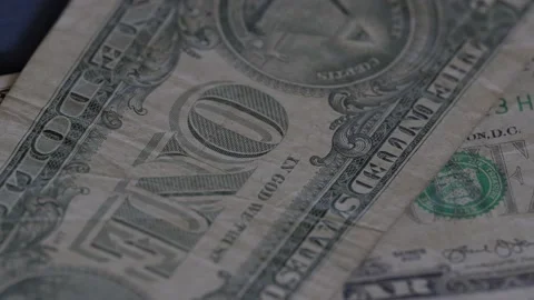 Close up of a one US dollar bills banknote rotating  - US Dollar - Cash money ba Video stock 230612966