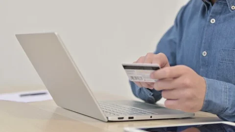 Close up of Online Payment by Man on Laptop Stock Footage 125347759