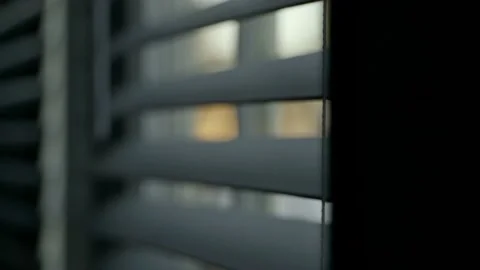 Close up open blinds moving eerie close up slow motion 스톡 동영상 148999922