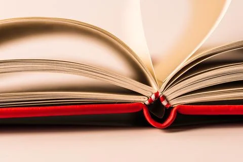 Close up open books on white background Stock Photos