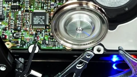 Close up of an open computer internal hard drive movement Stock Footage 283658050