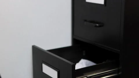 Close-up of an Open Filing Cabinet Drawer 4K Stock Footage 329326468