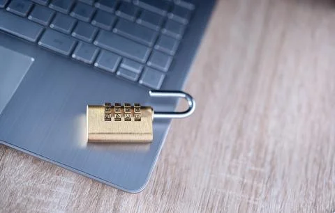 Close-up of an open numeric padlock on a laptop Stock Photos