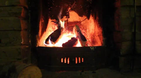 Close up Of Open Old Wood Fireplace Lit With Flames And Log At Front Stock Footage 36769342