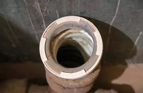 Close up of open plastic drainage pipe with rubber seal gasket. Constructio.. Stock Photos