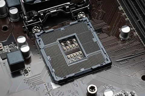 Close-up of an open slot for installing a processor. Modern motherboard befor Stock Photos