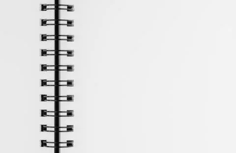 Close up of open spiral notebook blank white paper page with copy space Fotos de archivo