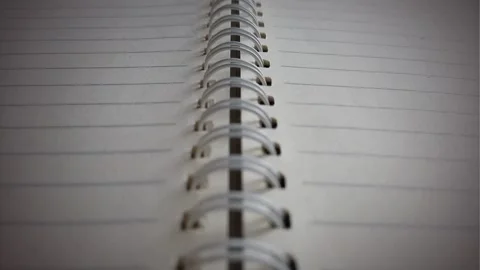 Close Up Of Open Spiral Notebook Ruled Pages Stock Footage 314124019