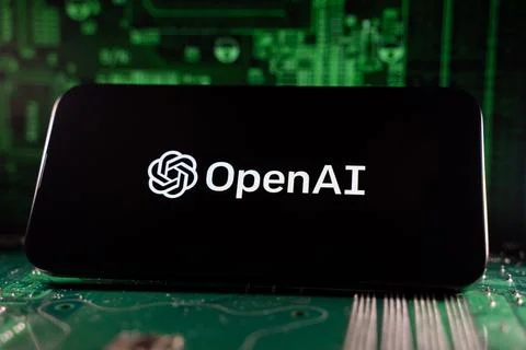 Close up of OpenAI logo on smartphone screen with motherboard background. Foto stock