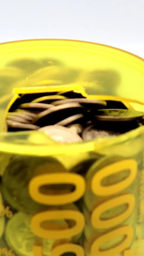 A close-up of the opened 500 yen coin piggy bank. Stock Footage 335226168