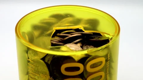 A close-up of the opened 500 yen coin piggy bank. Stock Footage 335234151
