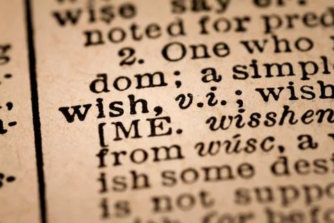 Close-up of an Opened Dictionary showing the Word WISH Fotos de archivo