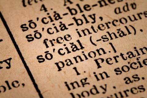 Close-up of an Opened Dictionary showing the Word SOCIAL Stock Photos