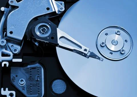 Close-up of the opened hard disk drive Stock Photos