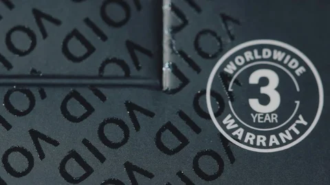 Close-up of opened hard disk packaging. Inscription VOID Stock Footage 103185408