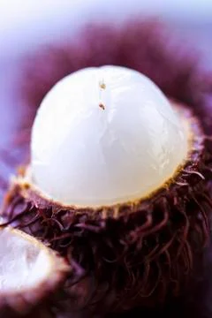A close-up of an opened rambutan 스톡 사진