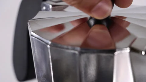 Close up opening and closing the lid of the Italian coffee maker Stock Footage 263058515
