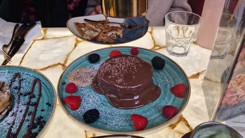 Close Up of Opening Belgian Chocolate Pancake Dessert Stock Footage 317948148