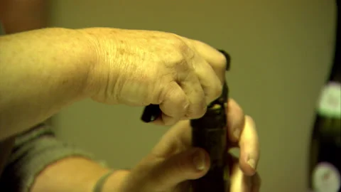 Close up of opening bottle of Chablis wine Stock Footage 130288852