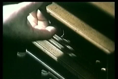 Close-up opening drawer containing gun and money Stock Footage 11346015