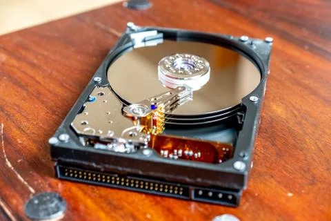 Close-up of an operating computer harddisk reading and writing data Stock Photos