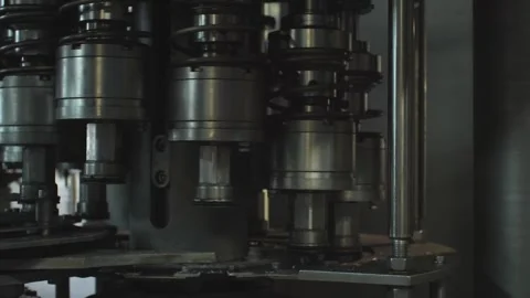 Close-up of the operation of the automatic tightening of the cork on a plasti Stock Footage 279919283