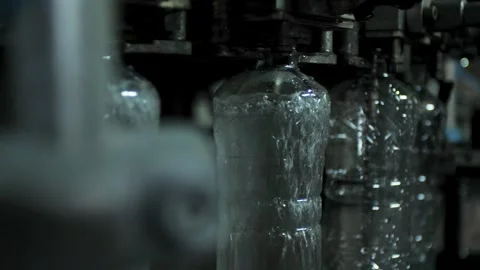 Close-up of the operation of the automatic tightening of the cork on a plasti Stock Footage 279919356