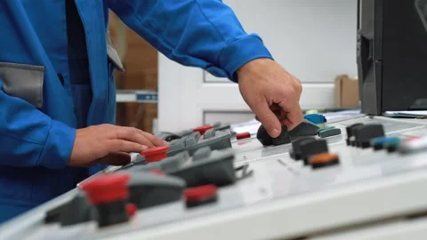 Close-up. Operation of control panel of CNC machine by skilled worker in Video stock 280189067