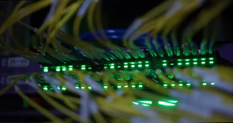 Close Up Optical Fiber Optic Cable Connected to Data Center Internet Network Stock Footage 156340838