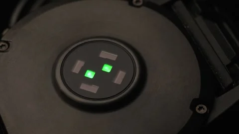 Close-up of optical heart rate sensor flashing green light Stock Footage 264979310