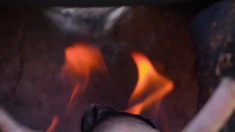 Close-up of Orange and Yellow Flames Burning Inside Fireplace Vídeos de archivo 334708931