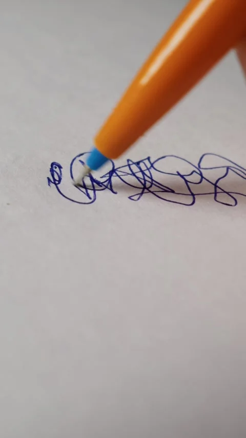 Close Up of an Orange Ballpoint Pen Writing Blue Ink on White Paper Stock Footage 339365989