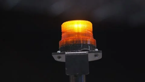 Close-up of orange beacon light blinking Stock Footage 345402707