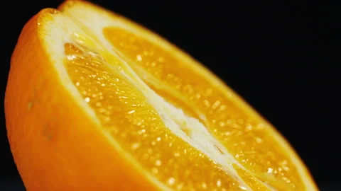 Close-up of an orange cut in half. Stock Footage 101677818