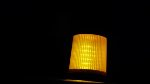 Close up， Orange Emergency Strobe Light flashing in the night. Stockbeeldmateriaal 131073429