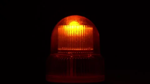 Close up of an orange flashing caution light Stock Footage 320801647