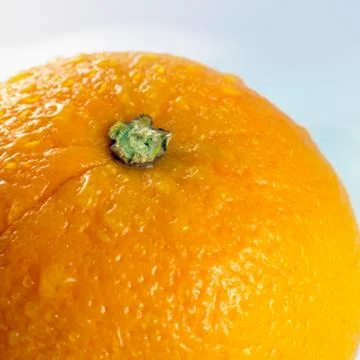 Close-up of an orange isolated on a white background Stock Photos