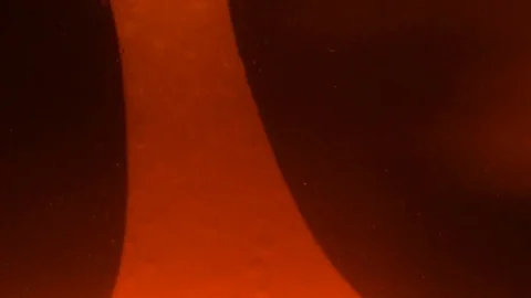 Close up of orange lava lamp bubbles with a  macro lens. Stock Footage 108426520
