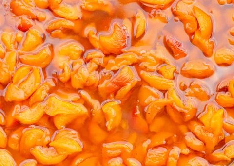 Close up orange peach jam texture background. Abstract fruit backdrop for design Stock Photos