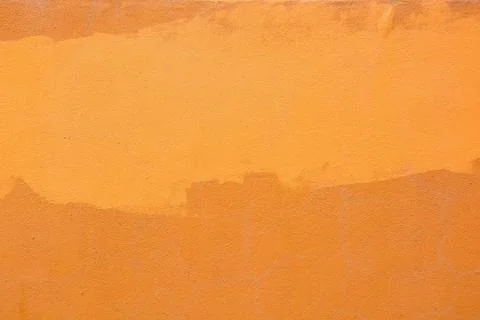 Close up orange plaster surface texture background Stock Photos