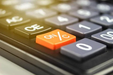 Close up orange power button (ON/C) in calculator 스톡 사진