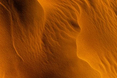 Close up orange sand texture in Empty Quarter Desert in United Arab Emirates. Stock Photos