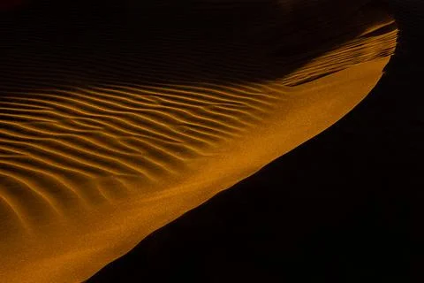 Close up orange sand texture in Empty Quarter Desert in United Arab Emirates. Stock Photos
