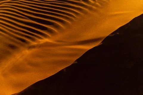 Close up orange sand texture in Empty Quarter Desert in United Arab Emirates. Stock Photos