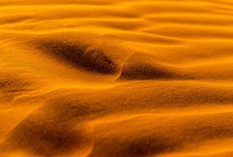Close up orange sand texture in Empty Quarter Desert in United Arab Emirates. Stock Photos